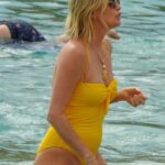 Charlize Theron Sexy In Yellow Bikini 15 Photos