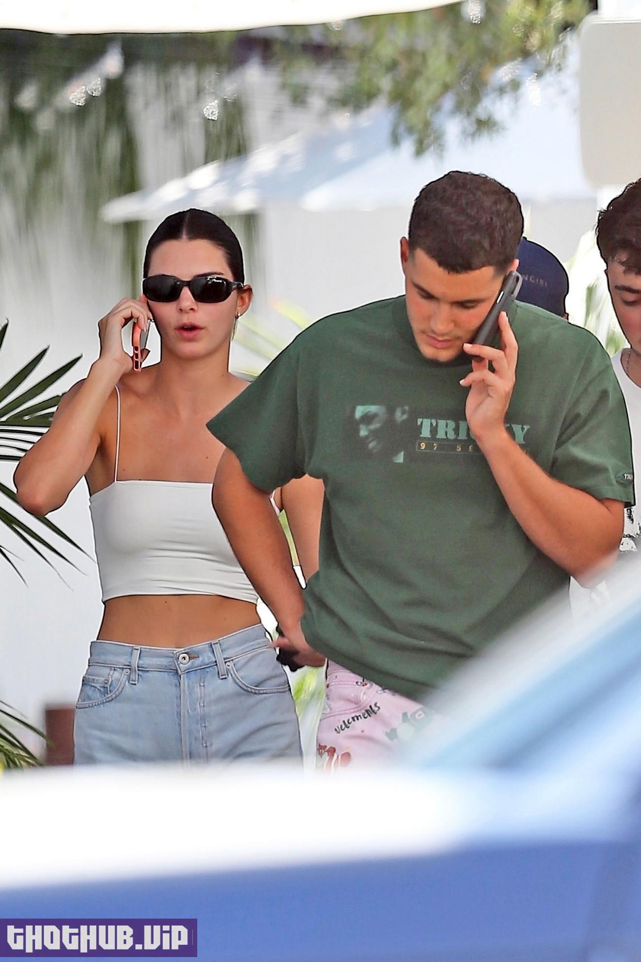 Kendall Jenner In A White Top And Trendy Blue Jeans