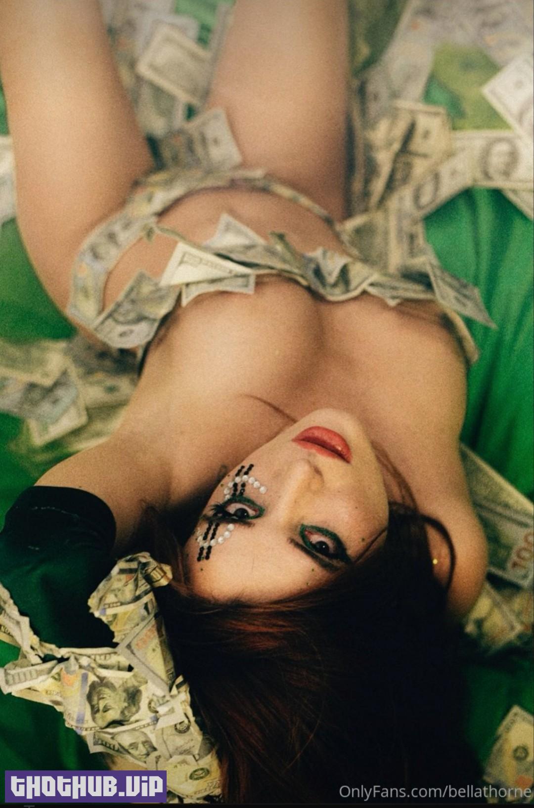 1664662075 472 Bella Thorne Covers Her Tits With Dollars 4 Photos
