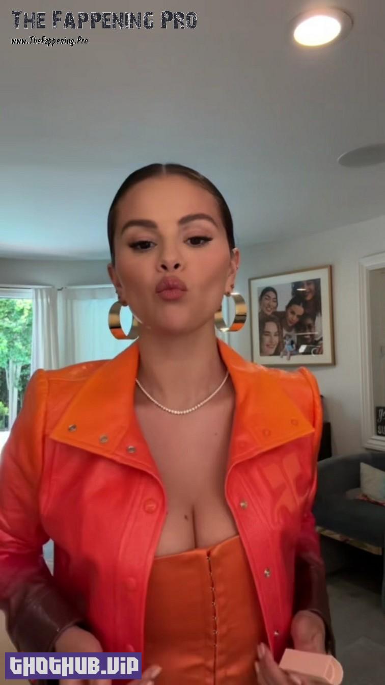 1699287595 230 Selena Gomez Big Tits In Orange Dress 9 Photos And