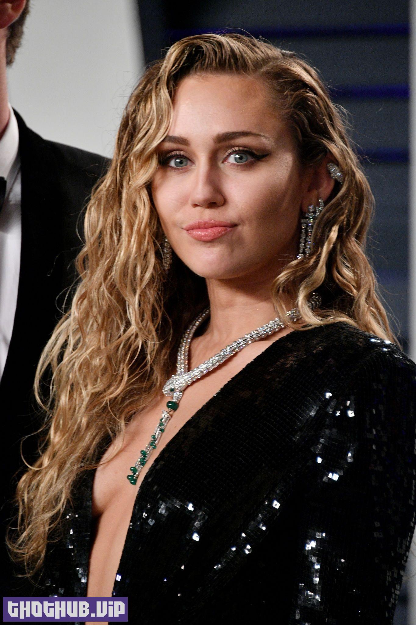 1701653803 565 Miley Cyrus TheFappening Sexy Sideboobs at Oscar Party