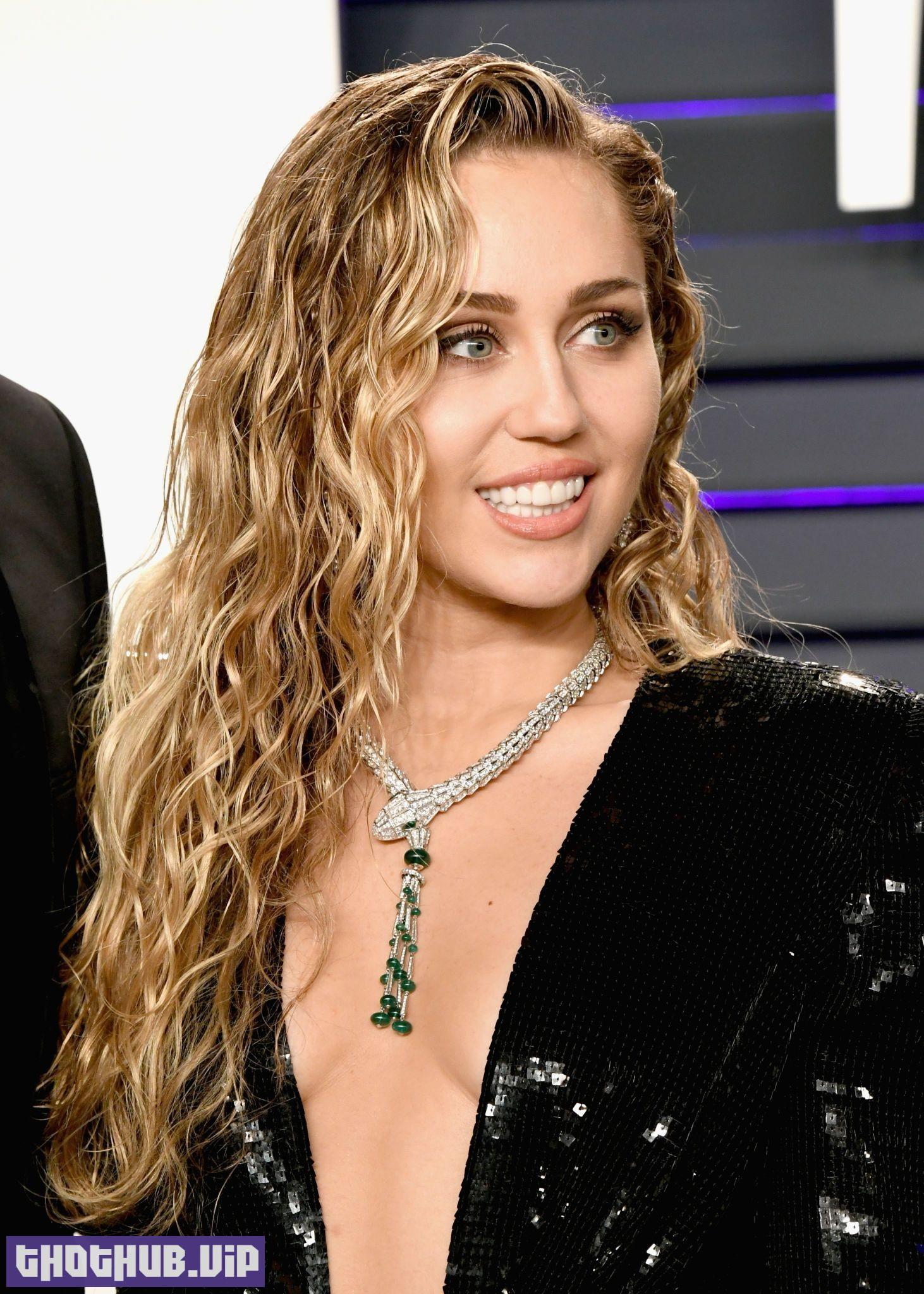 1701653873 153 Miley Cyrus TheFappening Sexy Sideboobs at Oscar Party