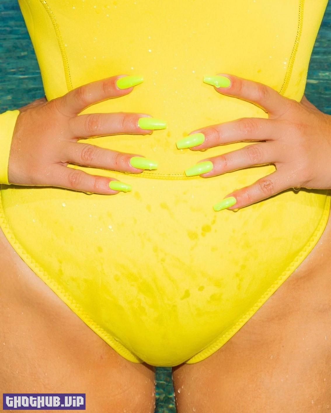 1706504131 144 Kim Kardashian In Yellow One Piece Swimsuit 5 Photos