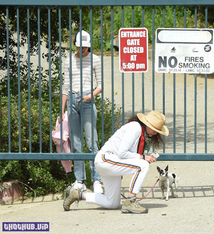 1707035185 189 Sisters Qualley And Andie MacDowell Walking In Closed Park 40