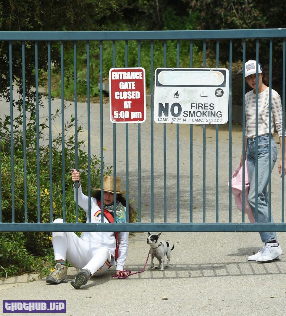 1707035197 98 Sisters Qualley And Andie MacDowell Walking In Closed Park 40