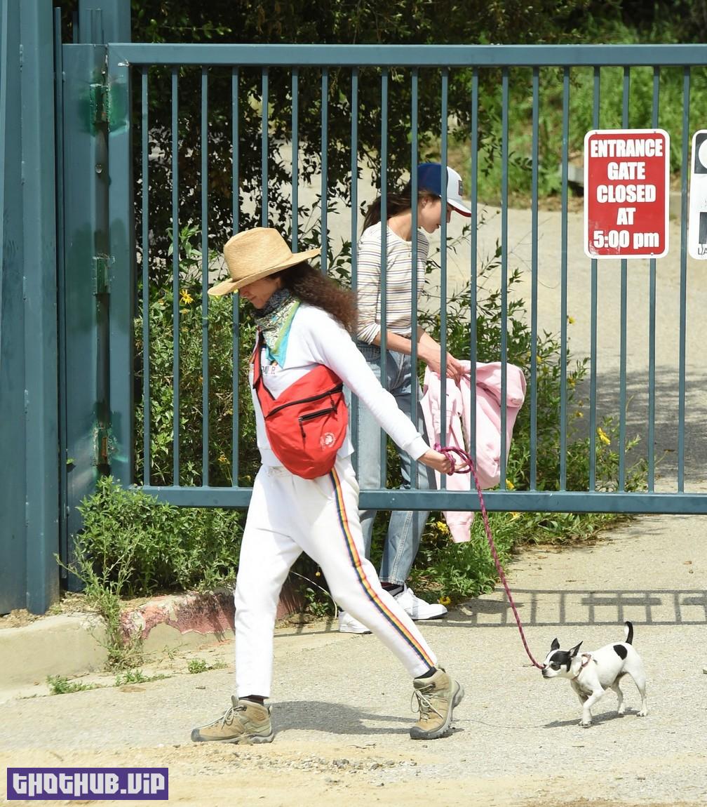1707035256 182 Sisters Qualley And Andie MacDowell Walking In Closed Park 40